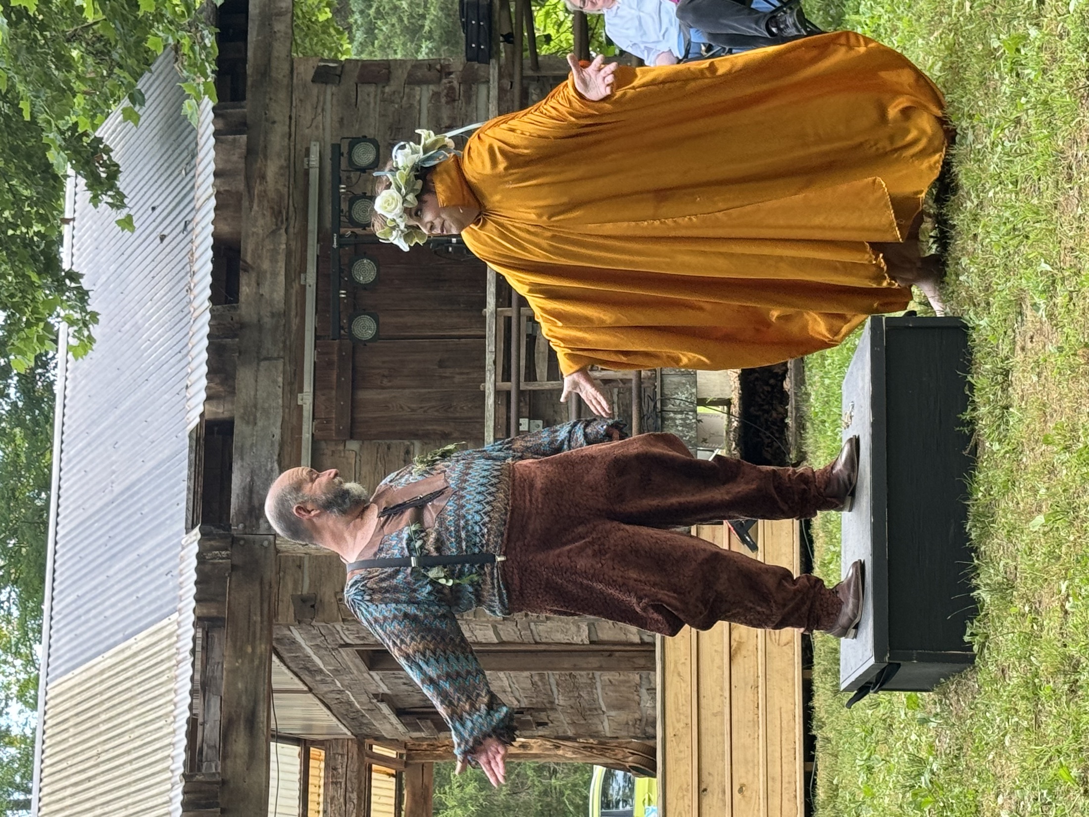 Two fairy characters meet in a bright outdoor scene